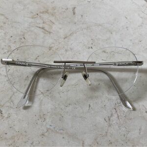 STARCK Eyeglasses Frames Rimless Silver Round